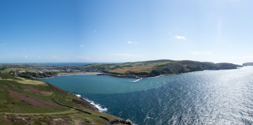 This image: a photo showing the view over Port Erin and east
							 		 towards Port St Mary and Castletown.
		 							 The map: The map has zoomed in to the site location, between
									 the A7, A3 and A5. The steam railway line is shown passing
									 south of the site. Also to the south is Castletown.